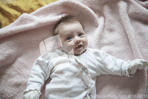 Image of happy newborn little baby smilling