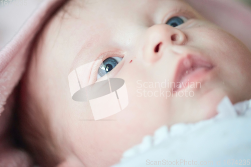 Image of happy newborn little baby smilling