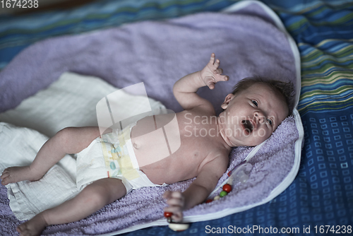 Image of happy newborn little baby smilling