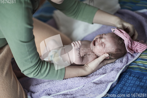 Image of happy newborn little baby smilling