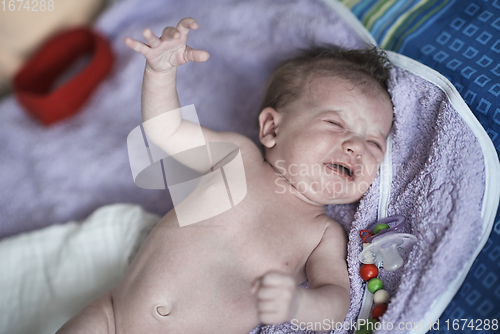 Image of happy newborn little baby smilling