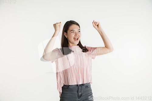 Image of Beautiful girl\'s half-length portrait on white studio background