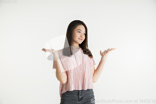 Image of Beautiful girl\'s half-length portrait on white studio background