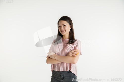 Image of Beautiful girl\'s half-length portrait on white studio background