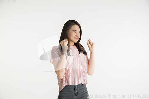 Image of Beautiful girl\'s half-length portrait on white studio background