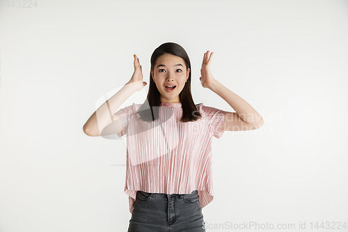 Image of Beautiful girl\'s half-length portrait on white studio background