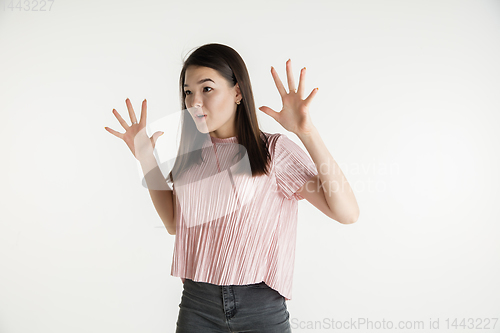 Image of Beautiful girl\'s half-length portrait on white studio background