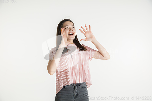 Image of Beautiful girl\'s half-length portrait on white studio background