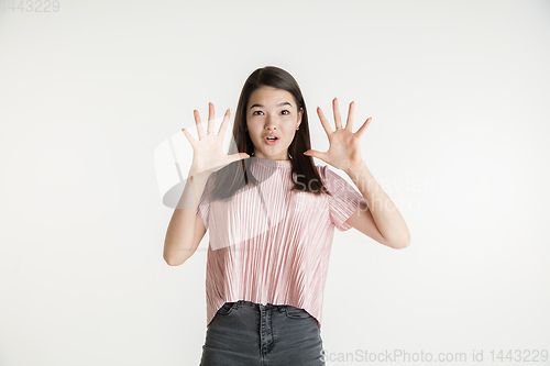 Image of Beautiful girl\'s half-length portrait on white studio background