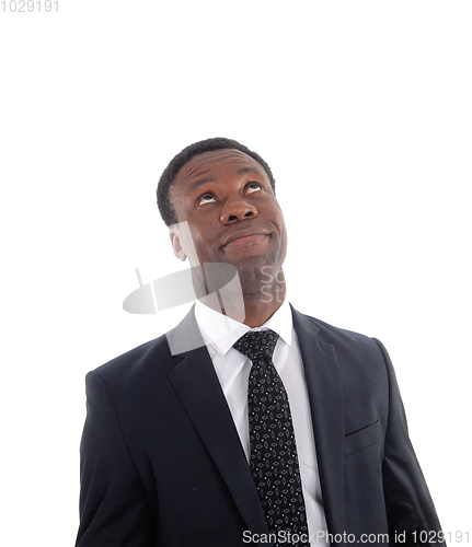 Image of Portrait of a business man looking up