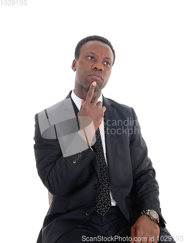 Image of African business man thinking