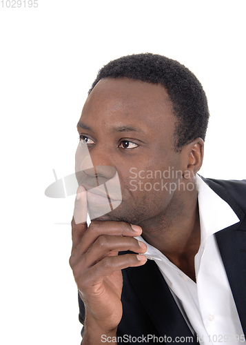Image of Portrait of African man with hand on chin