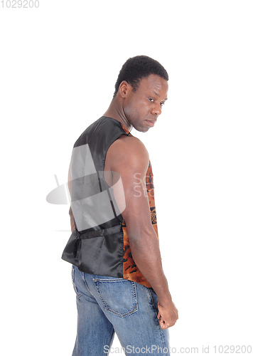 Image of African man standing in profile