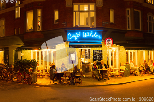 Image of People street restaurant night Copenhagen