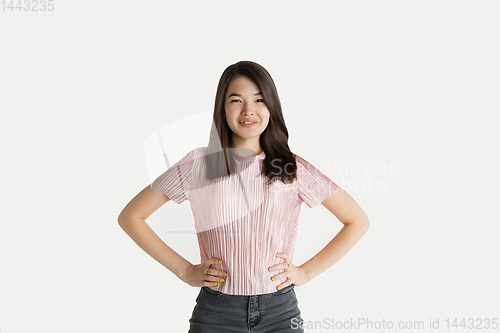 Image of Beautiful girl\'s half-length portrait on white studio background