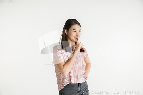 Image of Beautiful girl\'s half-length portrait on white studio background