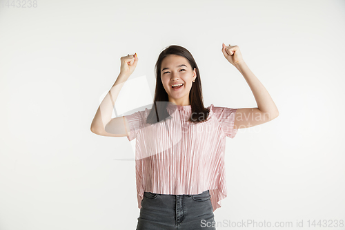 Image of Beautiful girl\'s half-length portrait on white studio background