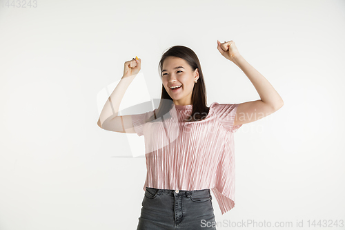 Image of Beautiful girl\'s half-length portrait on white studio background