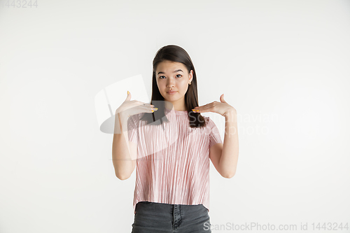 Image of Beautiful girl\'s half-length portrait on white studio background