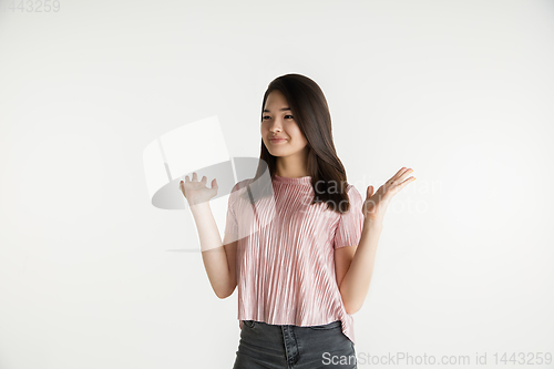 Image of Beautiful girl\'s half-length portrait on white studio background
