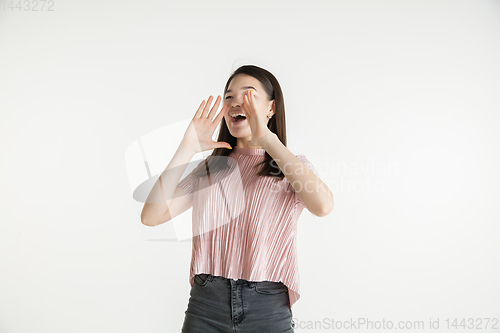 Image of Beautiful girl\'s half-length portrait on white studio background