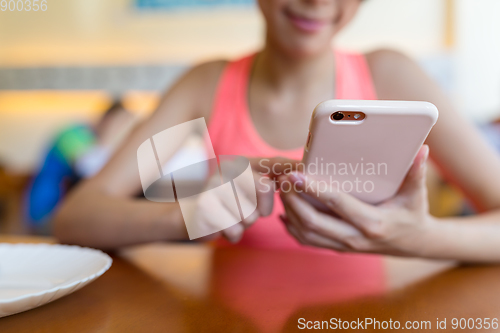 Image of Woman use of cellphone