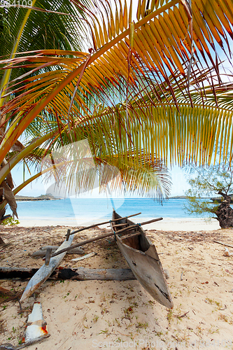 Image of abandoned boat in sandy beach in madagascar