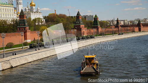 Image of MOSCOW - MAY 7: water surface cleaning boat at Moscow river. on May 7, 2017 in Moscow, Russia.