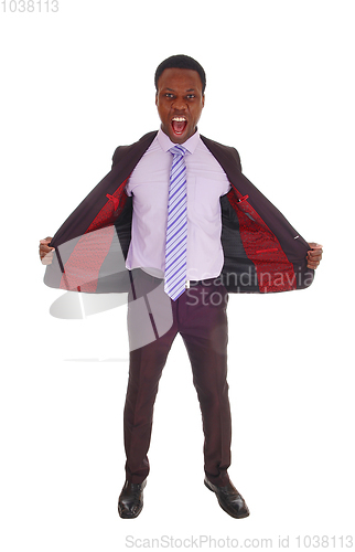 Image of African man standing in suit and tie