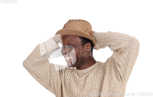 Image of Happy black man smiling with hat