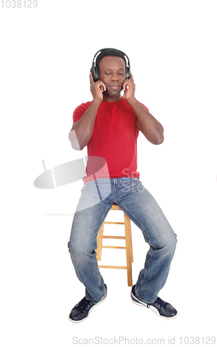 Image of Man dreaming with music from headphone