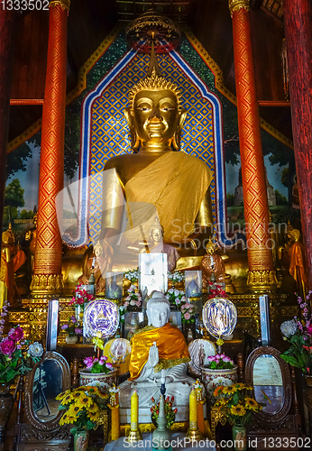 Image of Buddha statue in Wat Chomphu temple, Chiang Mai, Thailand