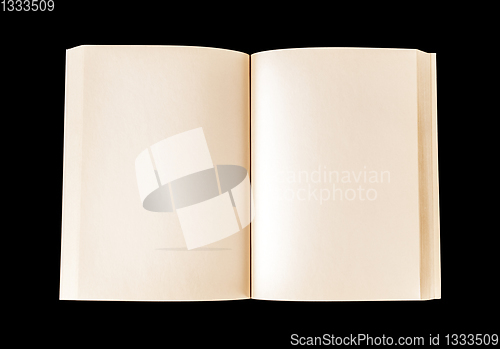 Image of Old open blank book isolated on black