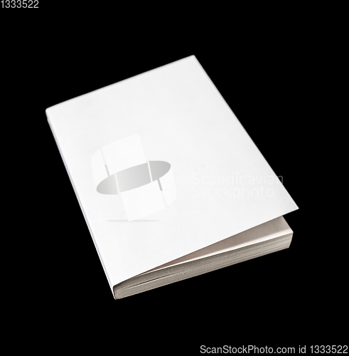 Image of Closed blank book isolated on black