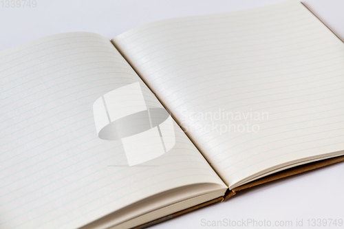 Image of Open blank notebook closeup view