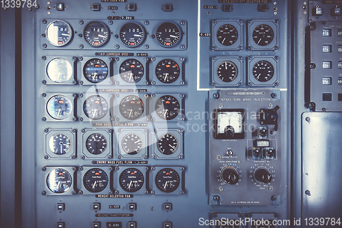 Image of Old airplane control panel in cockpit