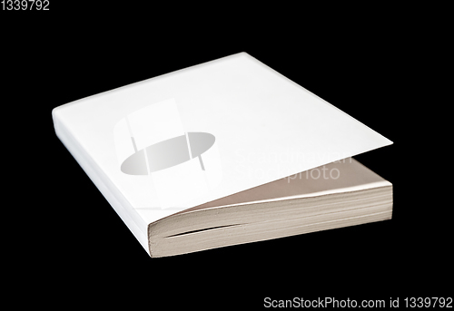 Image of Closed blank book isolated on black