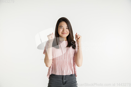 Image of Beautiful girl\'s half-length portrait on white studio background