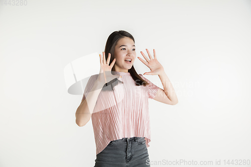 Image of Beautiful girl\'s half-length portrait on white studio background