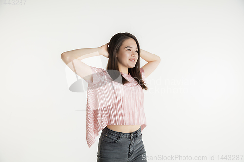 Image of Beautiful girl\'s half-length portrait on white studio background