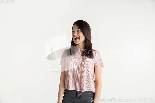 Image of Beautiful girl\'s half-length portrait on white studio background