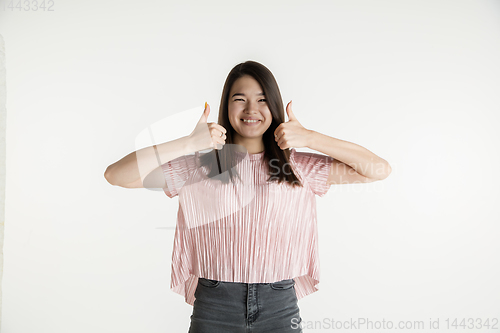 Image of Beautiful girl\'s half-length portrait on white studio background