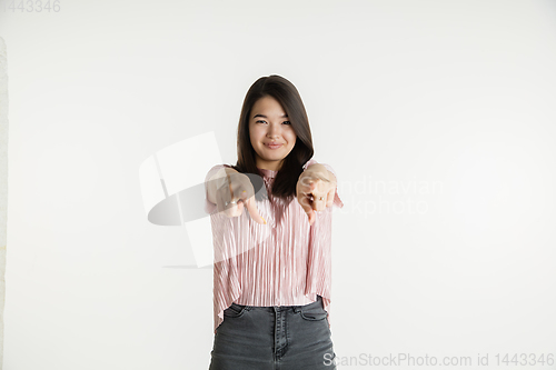 Image of Beautiful girl\'s half-length portrait on white studio background