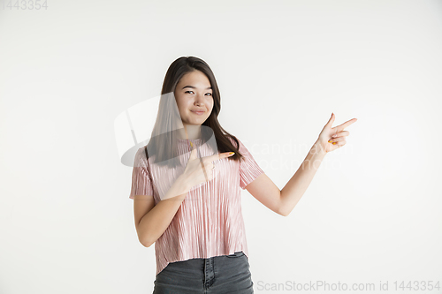 Image of Beautiful girl\'s half-length portrait on white studio background