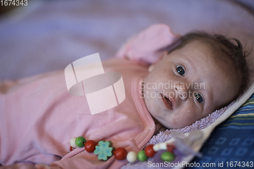 Image of happy newborn little baby smilling