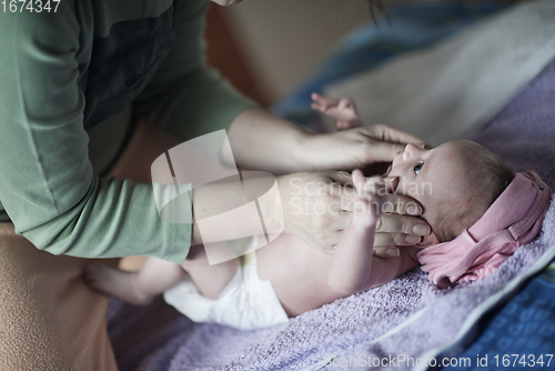 Image of happy newborn little baby smilling