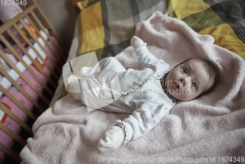 Image of happy newborn little baby smilling