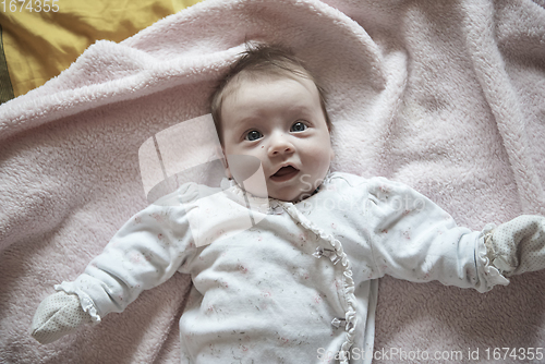 Image of happy newborn little baby smilling