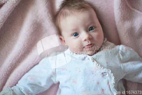 Image of happy newborn little baby smilling