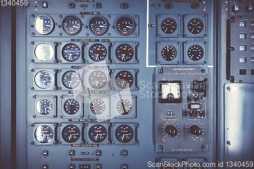 Image of Old airplane control panel in cockpit